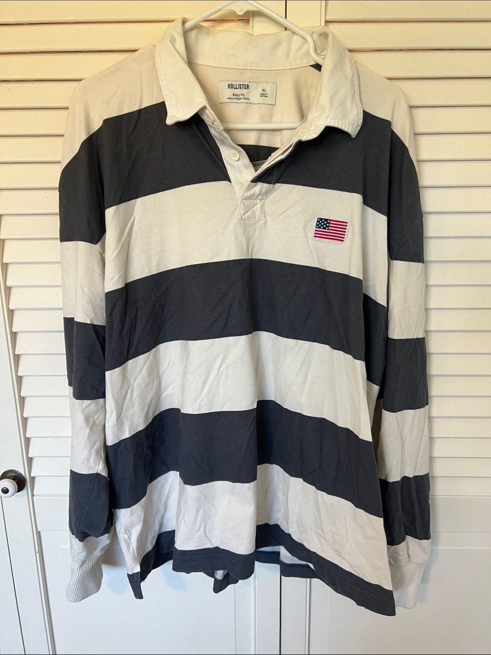 Hollister Men’s Navy and White Wide-Stripe Rugby Shirt with Flag Patch